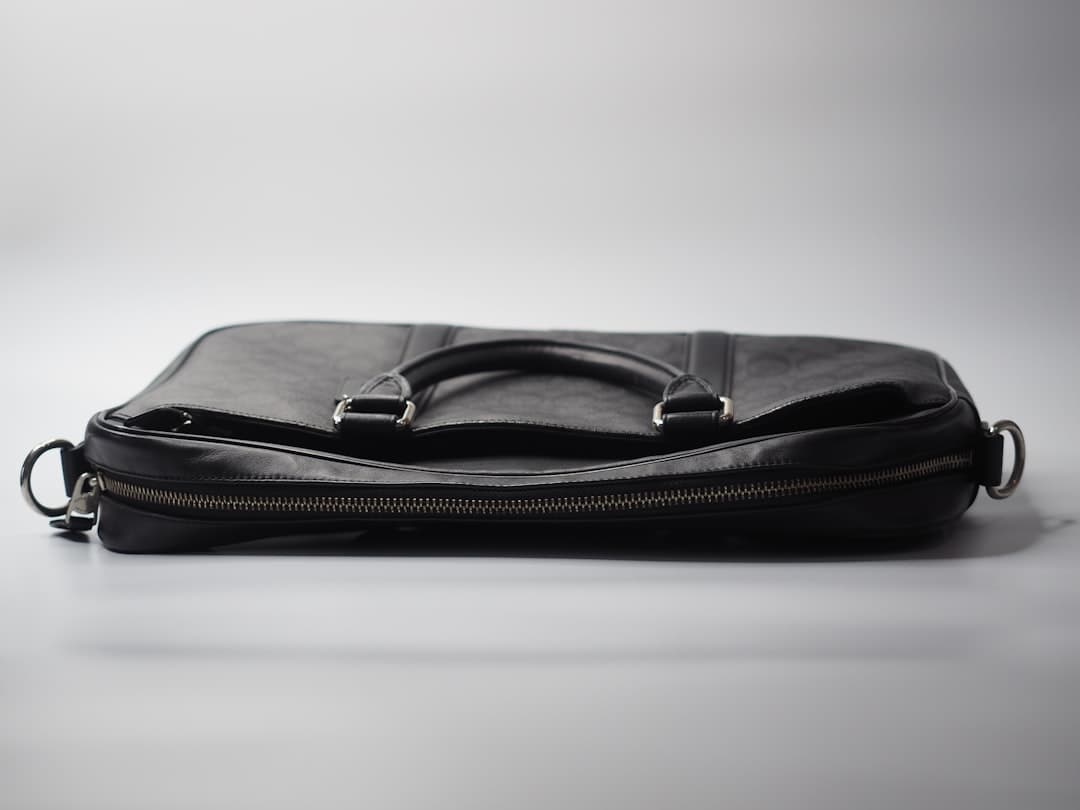 a black bag with a zipper on the inside of it