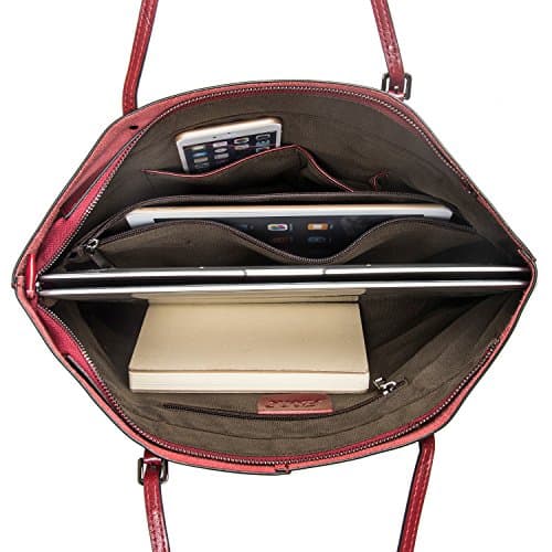 Sac cartable cuir rouge ouvert montrant compartiments intérieurs organisés