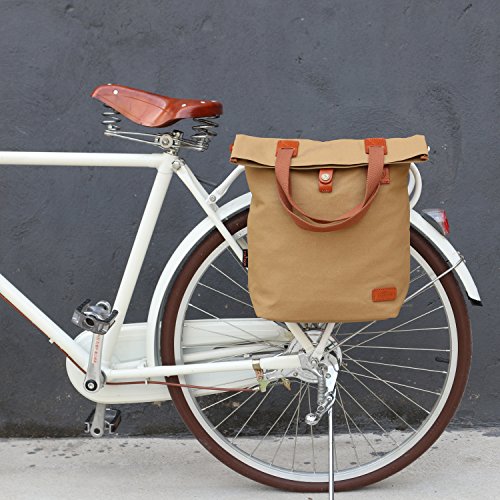 Grand sac besace avec anses en cuir et toile imperméable beige et marron qui se fixe sur le vélo