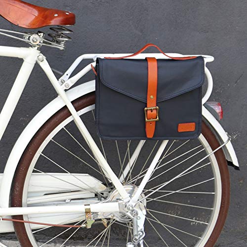 Petit cartable bandoulièn cuir et toile imperméable marine et marron qui se fixe sur le vélo, porte-bagage ou guidon